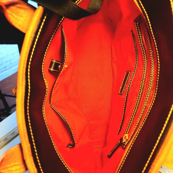 Dooney & Bourke Saffiano Tassel Bucket Tote Bag in black with tan trim - Picture 15 of 16